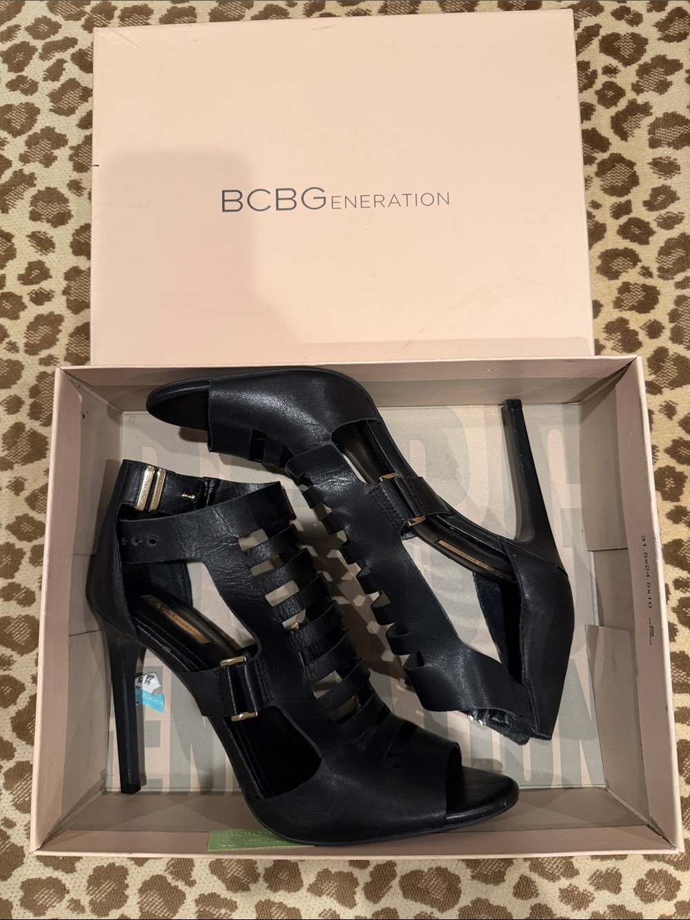 BCBGeneration Black Cutout Strappy Stiletto Sandals